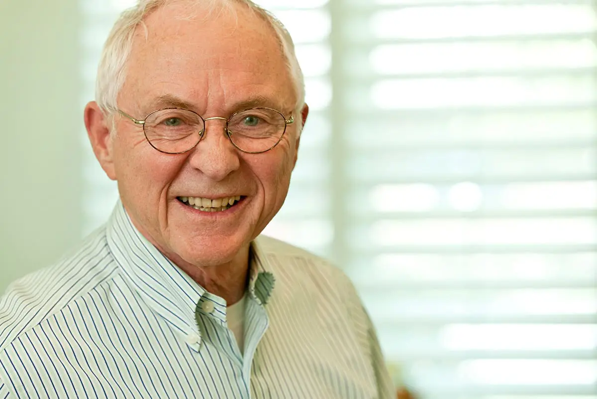Older gentleman smiling at camera Older gentleman smiling at camera