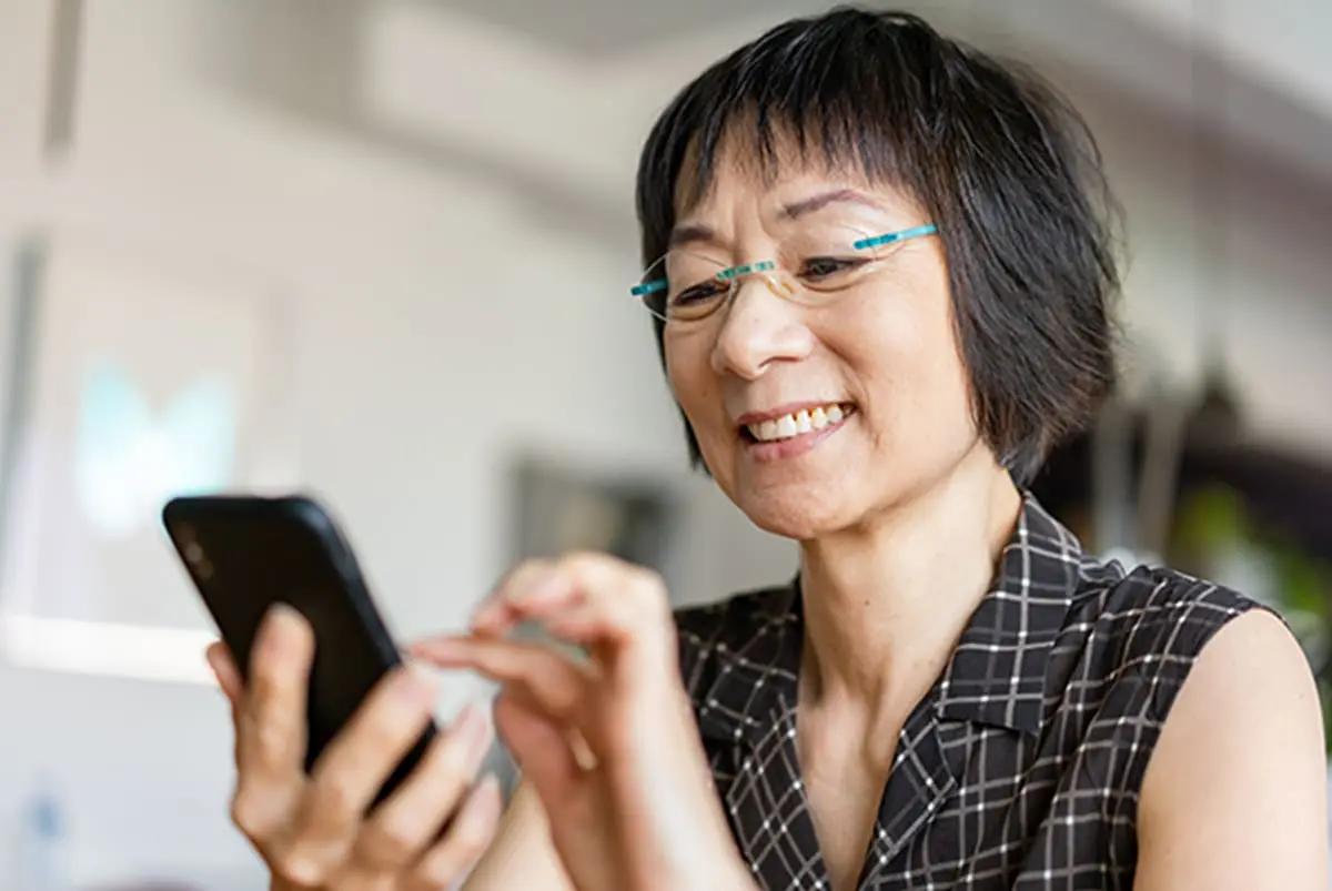 Older woman using smartphone Older woman using smartphone