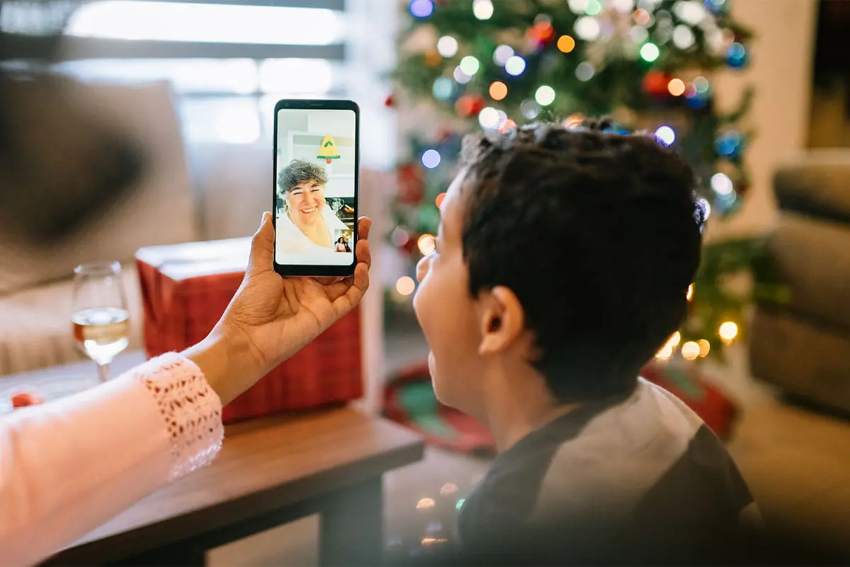 Person using Facetime on their cell phone Person using Facetime on their cell phone
