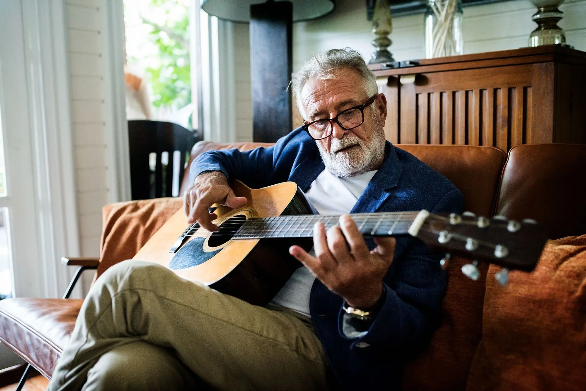 senior-playing-guitar