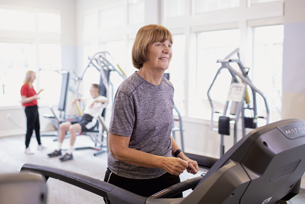 Seniors exercising and on treadmill