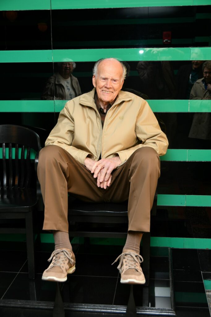 Gordon Heckle looks comfy sitting on a shoe-shine chair in The Hermitage mens room.