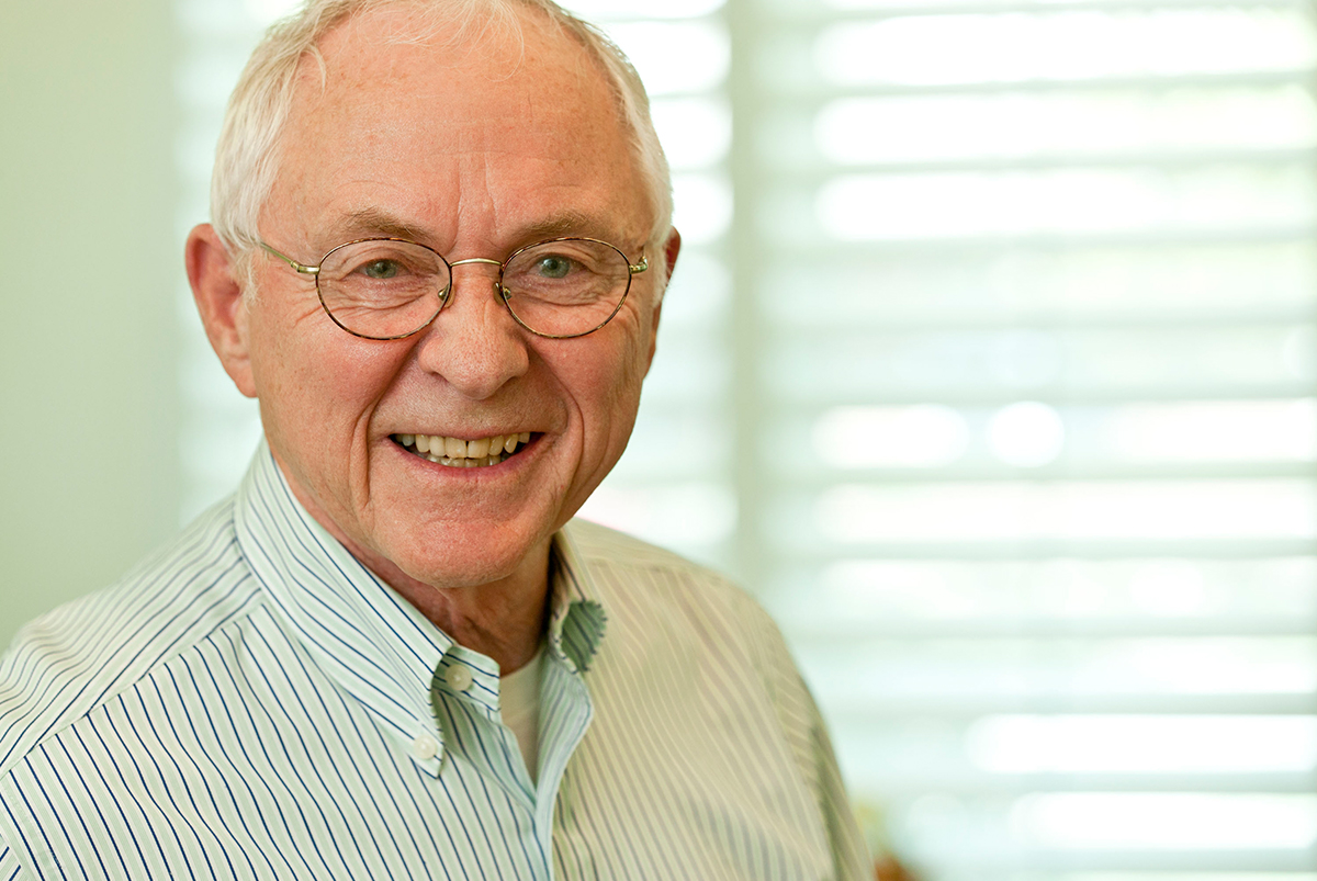 Older gentleman smiling at camera